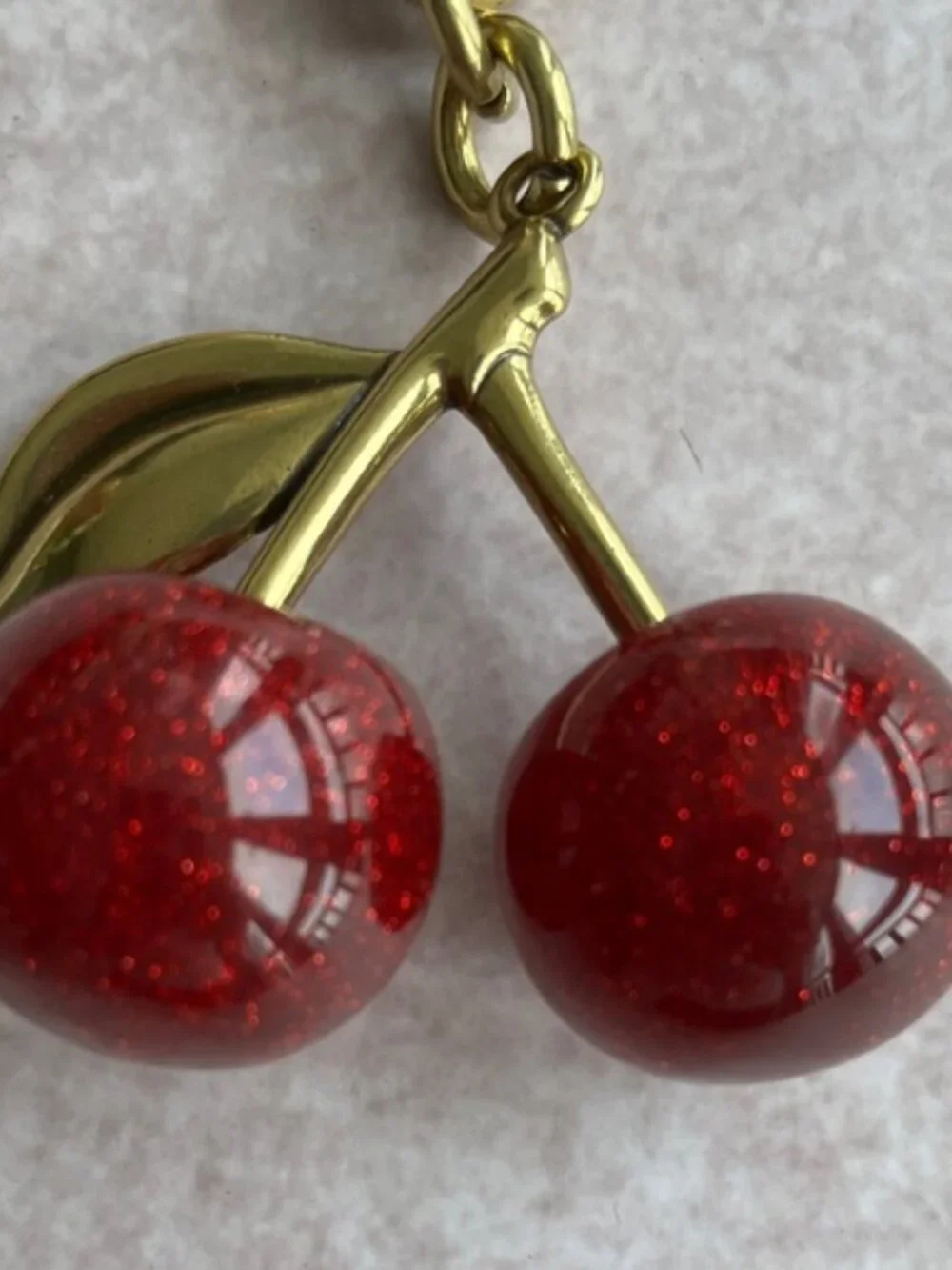 Coach Gold-Tone Cherry Key Charm with Red Glitter